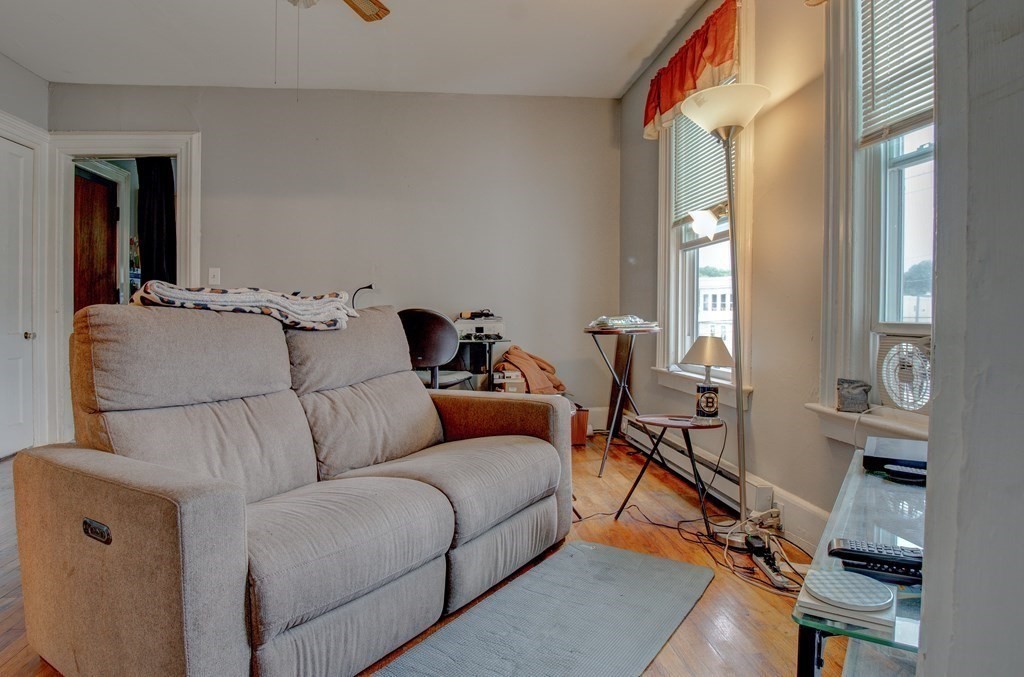 339 Front Street Chicopee, MA 01013 - Photo 18 of 22 a living room with furniture and a flat screen tv