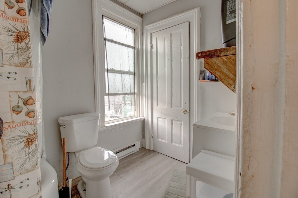 339 Front Street Chicopee, MA 01013 - Photo 19 of 22 a bathroom with a toilet and a shower