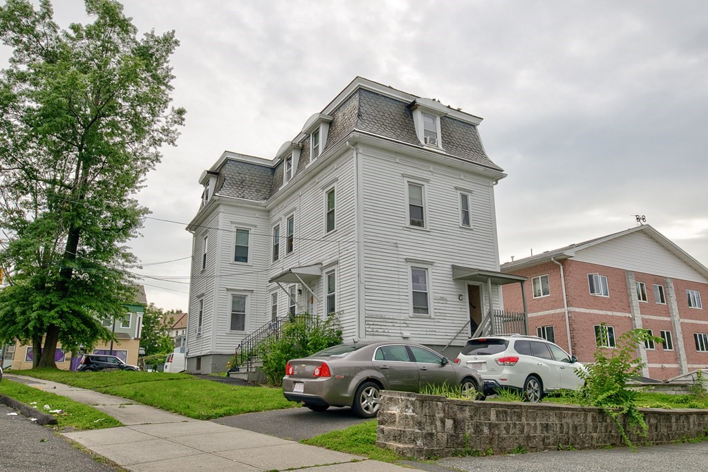 339 Front Street Chicopee, MA 01013 - Photo 6 of 22 a front view of a house with garden