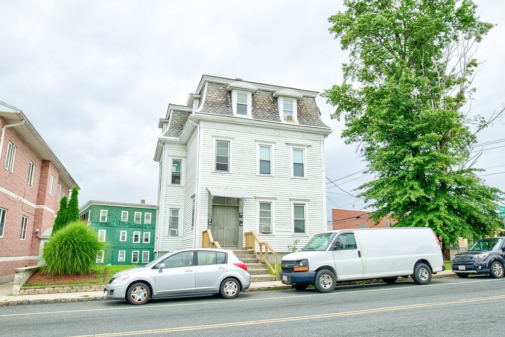 339 Front Street Chicopee, MA 01013 - Photo 10 of 22 a view of a cars park in front of a building