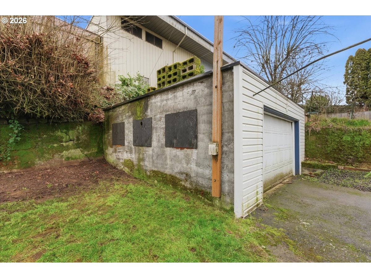 706 West B Street Rainier, OR 97048 - Photo 39 of 47 a view of a back yard of the house