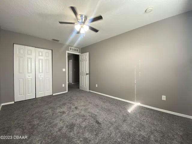 a view of a room with a large window