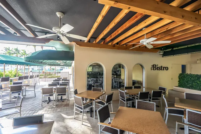 a view of a lake from a balcony with outdoor space