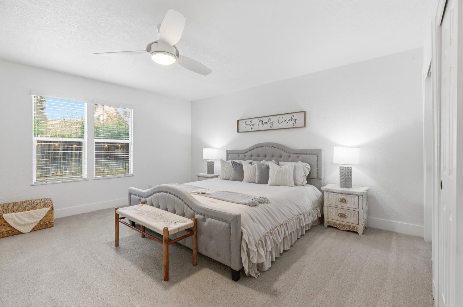 1671 Davis Street Ripon, CA 95366 - Photo 25 of 40 a spacious bedroom with a bed and a window