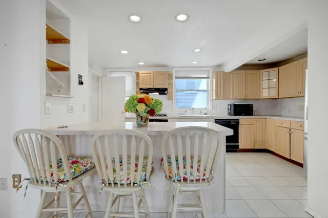 a bed room with furniture and a window