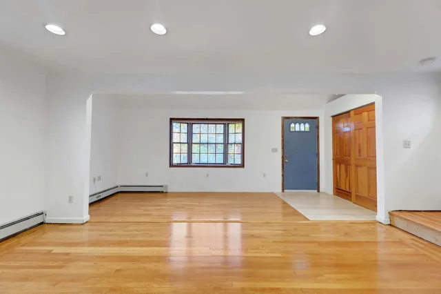 a view of an empty room and window