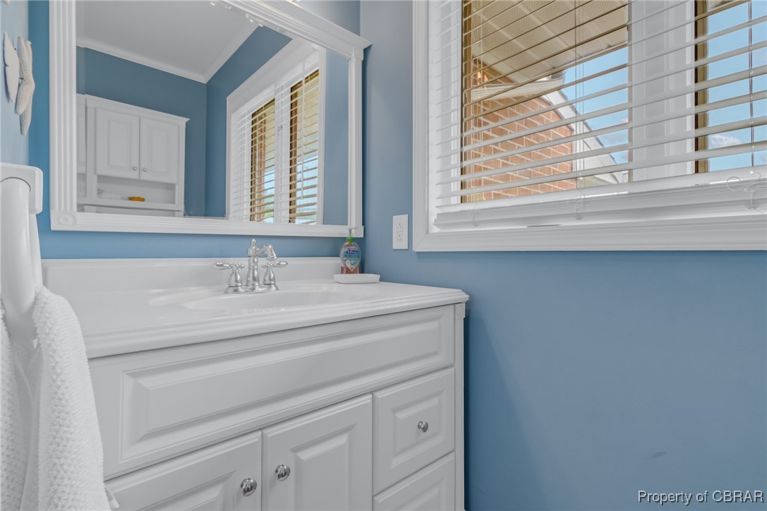 86 Greenfield Road Lancaster, VA 22503 - Photo 37 of 44 Bathroom with vanity and crown molding