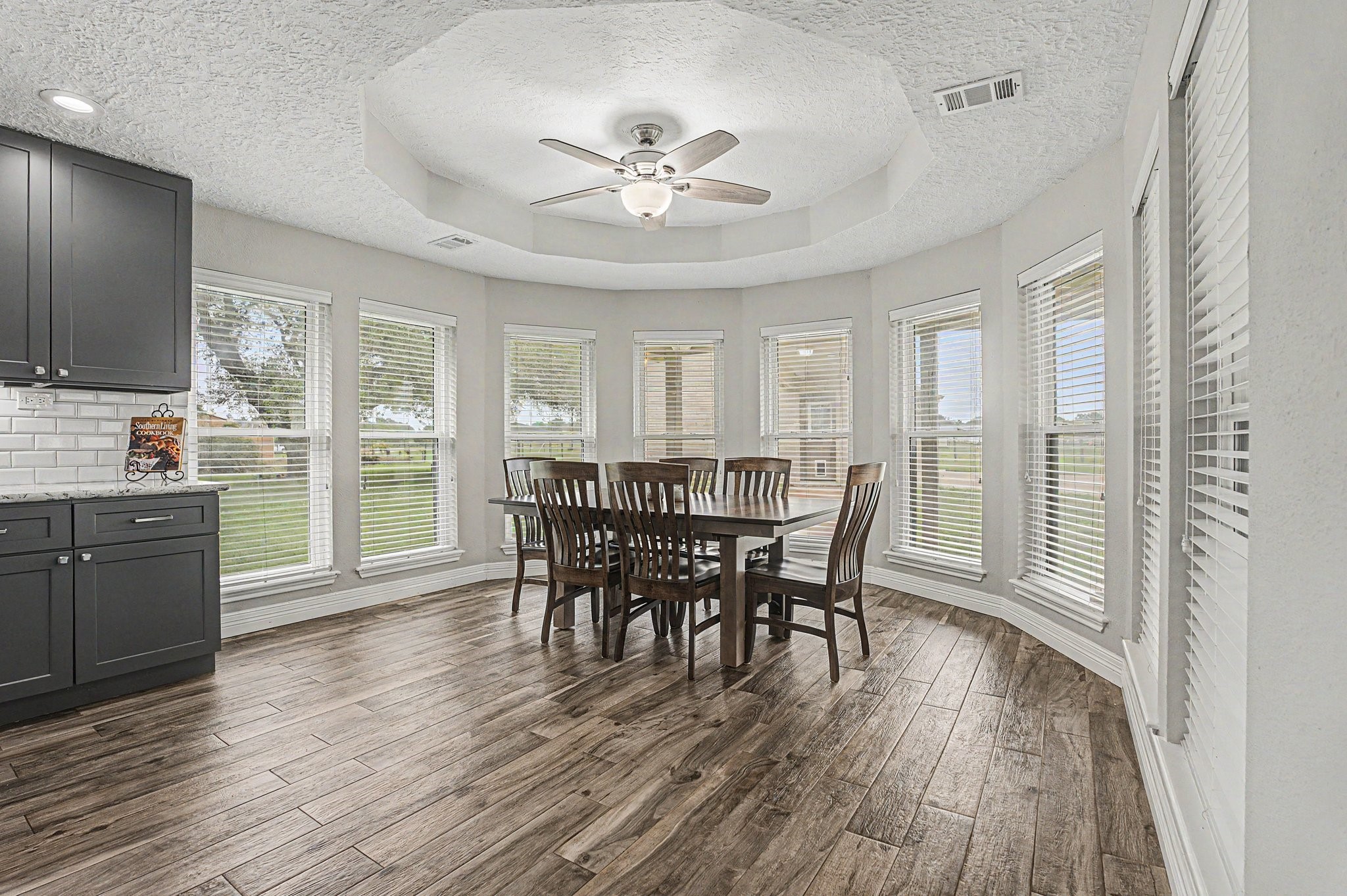 35564 Brumlow Road Hempstead, TX 77445 - Photo 11 of 46 a view of a dining room with furniture window and wooden floor