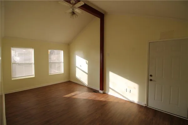 a view of an empty room and window