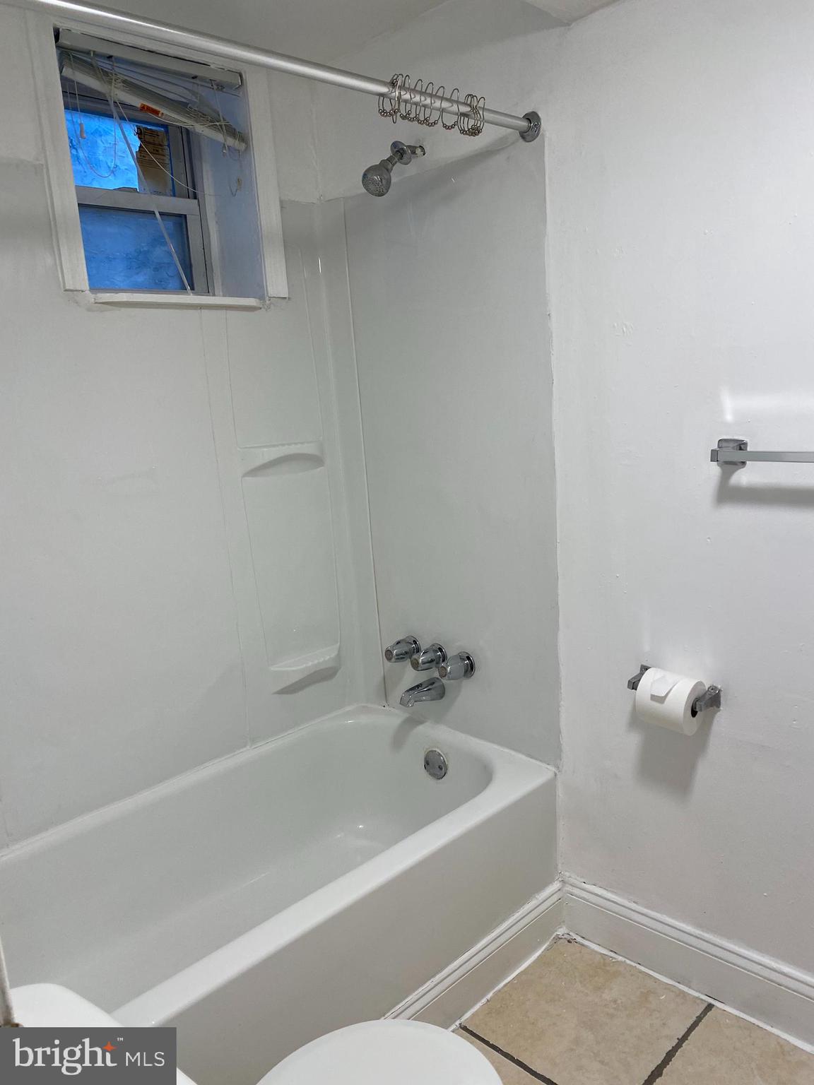 1012 South 12th Street, Unit 3 Philadelphia, PA 19147 - Photo 11 of 11 a bathroom with a bathtub and shower