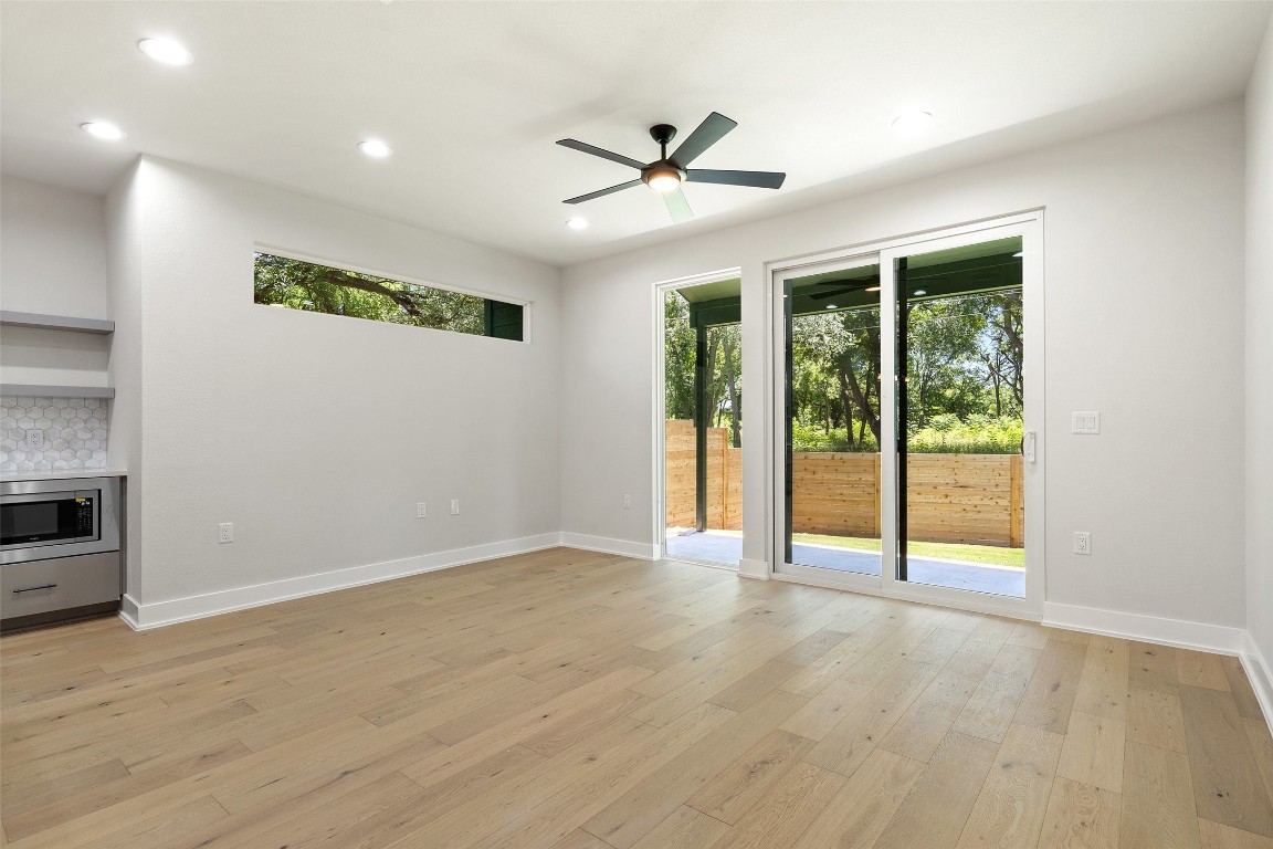 5109 Stone Gate Drive, Unit 2 Austin, TX 78721 - Photo 17 of 38 a view of an empty room with a window
