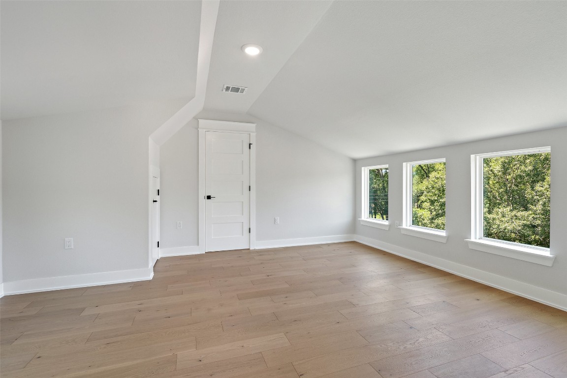 5109 Stone Gate Drive, Unit 2 Austin, TX 78721 - Photo 32 of 38 a view of an empty room with a window
