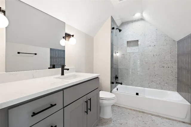 a view of a backyard with a large tree