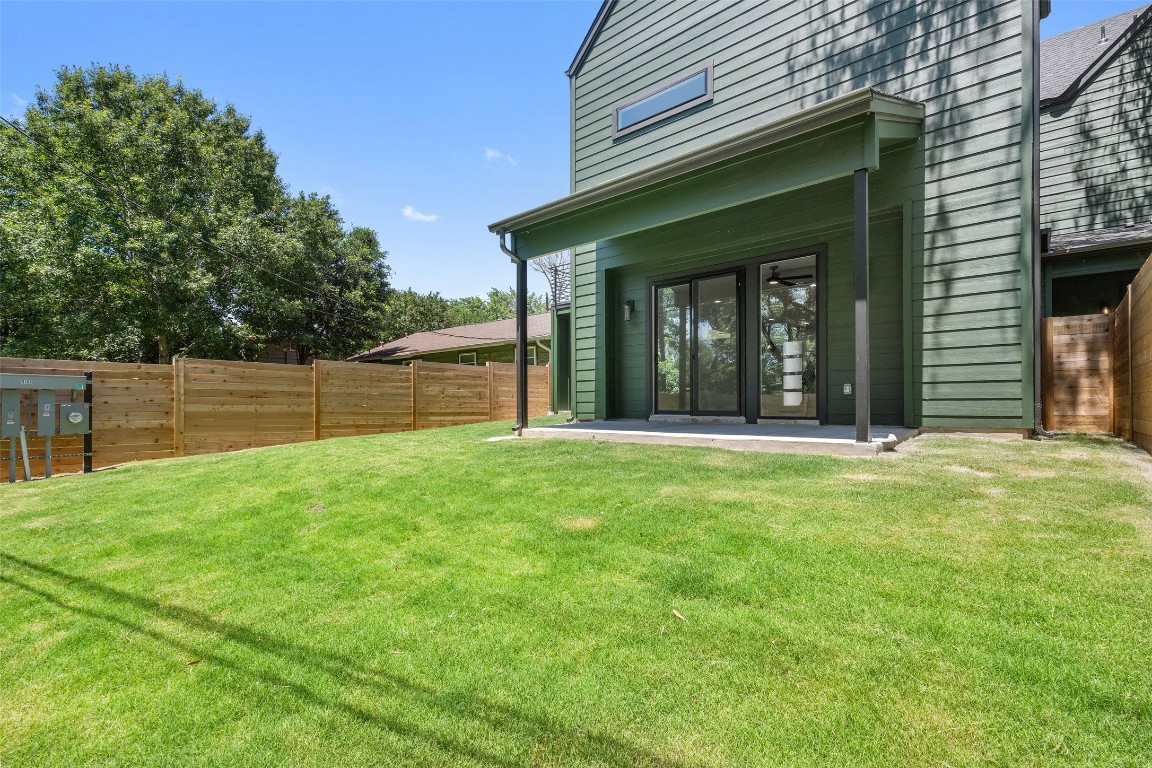 5109 Stone Gate Drive, Unit 2 Austin, TX 78721 - Photo 38 of 38 a view of a backyard with a garden and entertaining space