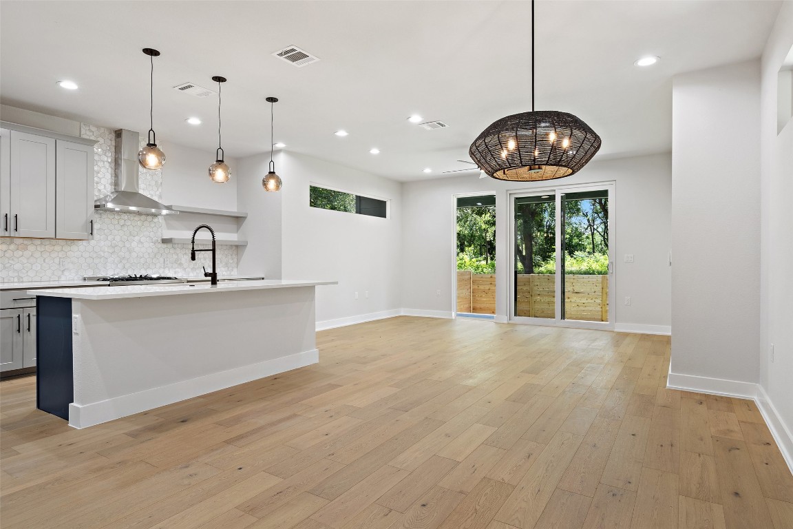 5109 Stone Gate Drive, Unit 2 Austin, TX 78721 - Photo 6 of 38 a view of a kitchen with a sink and window