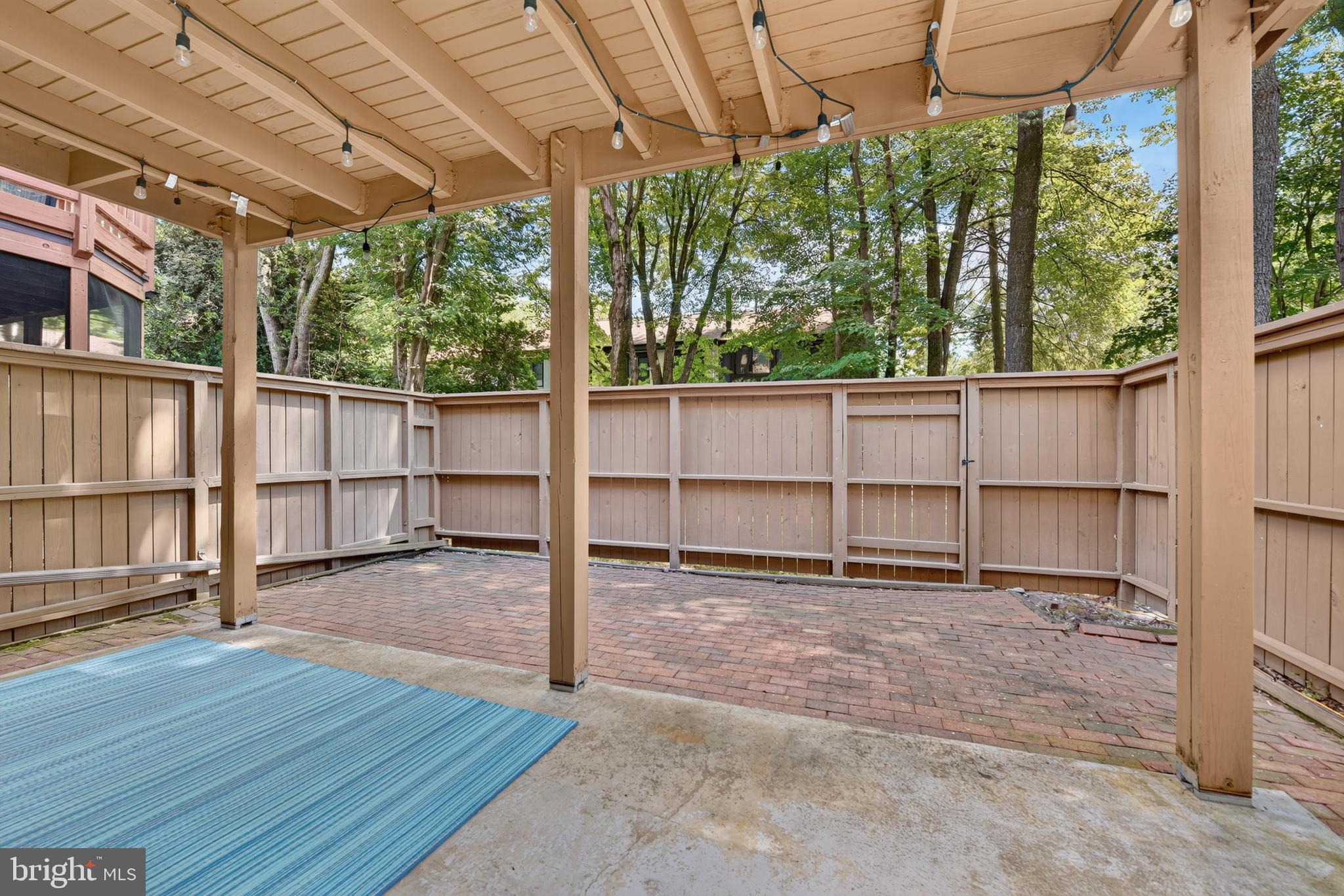 2031 Sarazen Place Reston, VA 20191 - Photo 24 of 27 Brick Patio & Fenced Backyard