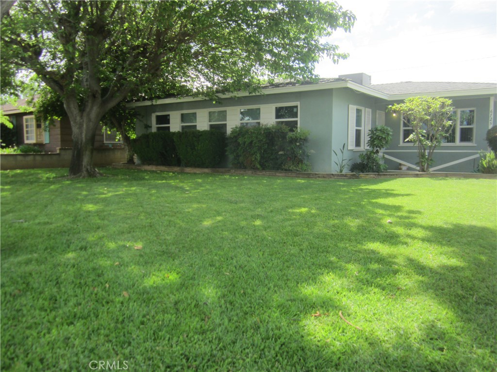 6725 De Anza Avenue Riverside, CA 92506 - Photo 2 of 25 a view of house with yard and green space