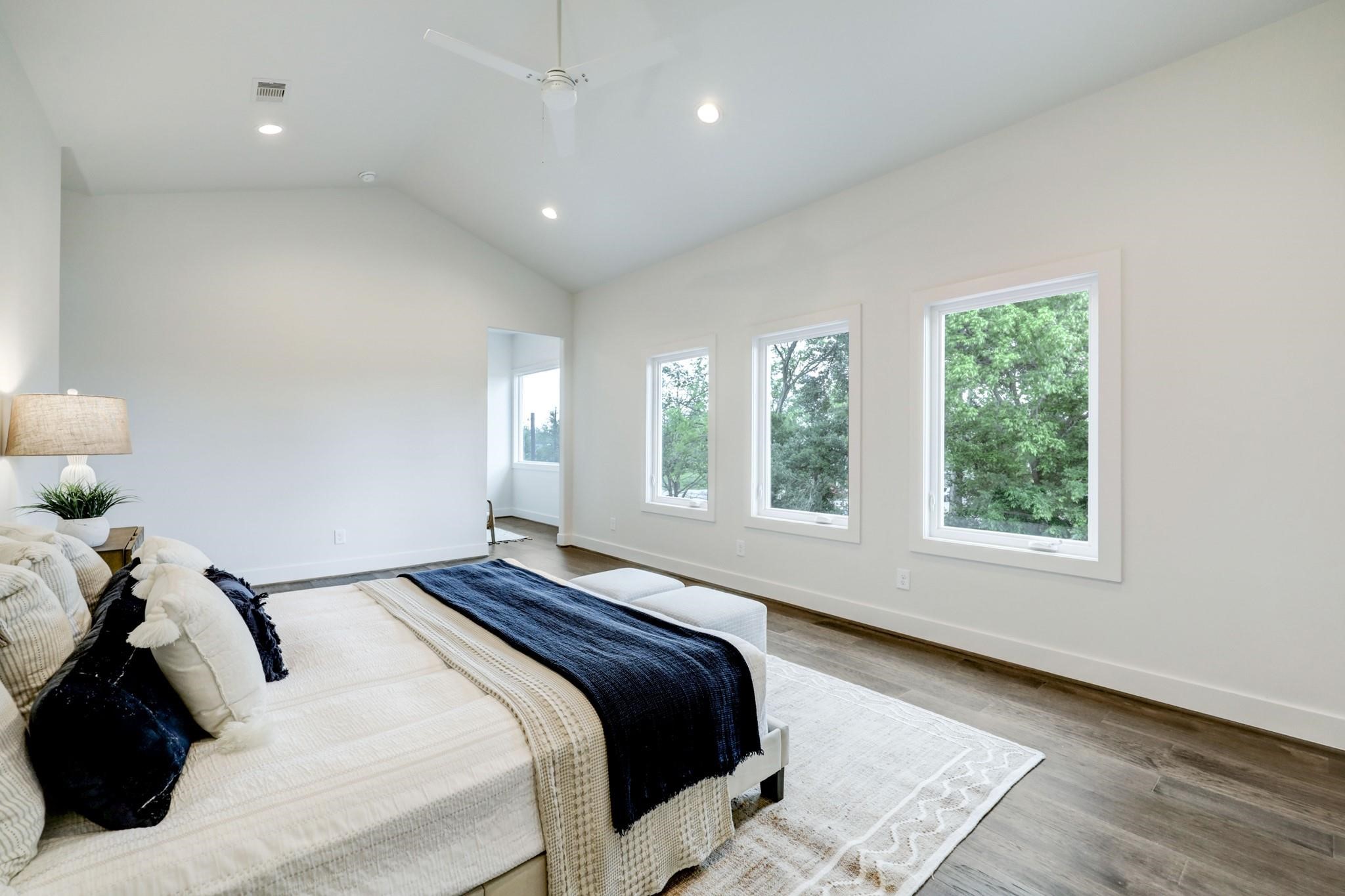 3827 Arlington Street Houston, TX 77018 - Photo 19 of 39 a bedroom with a bed and a window