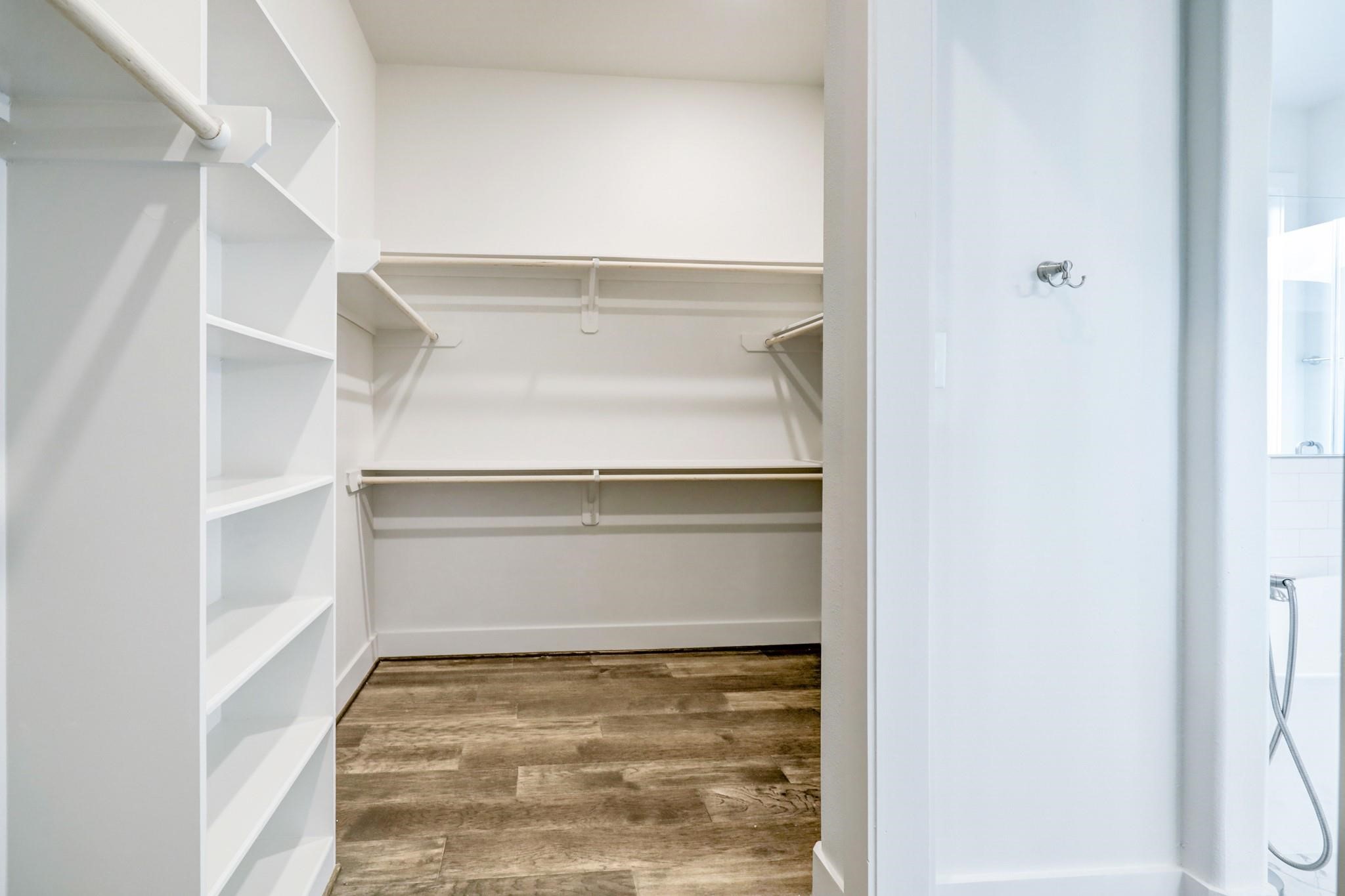 3827 Arlington Street Houston, TX 77018 - Photo 26 of 39 a view of walk in closet with empty racks