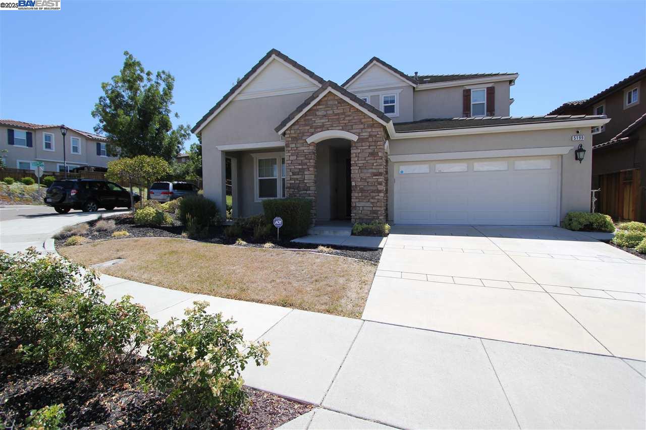 5199 Salerno Drive Dublin, CA 94568 - Photo 1 of 20 a front view of a house with a yard and garage