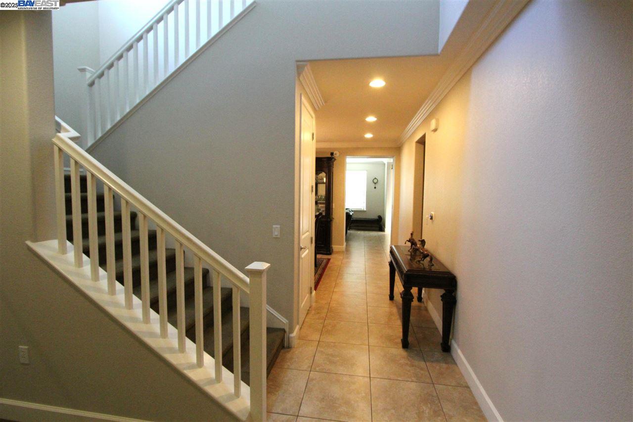 5199 Salerno Drive Dublin, CA 94568 - Photo 2 of 20 a view of a hallway with a livingroom and stairs