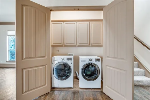 a utility room with dryer and washer