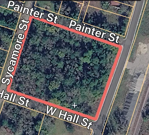 a street sign on a pole on a street