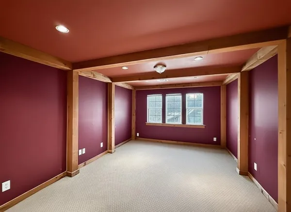 a view of livingroom with furniture and windows