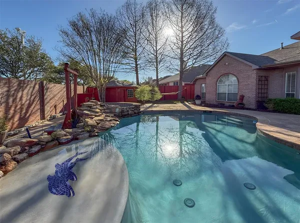 a view of house with outdoor seating space