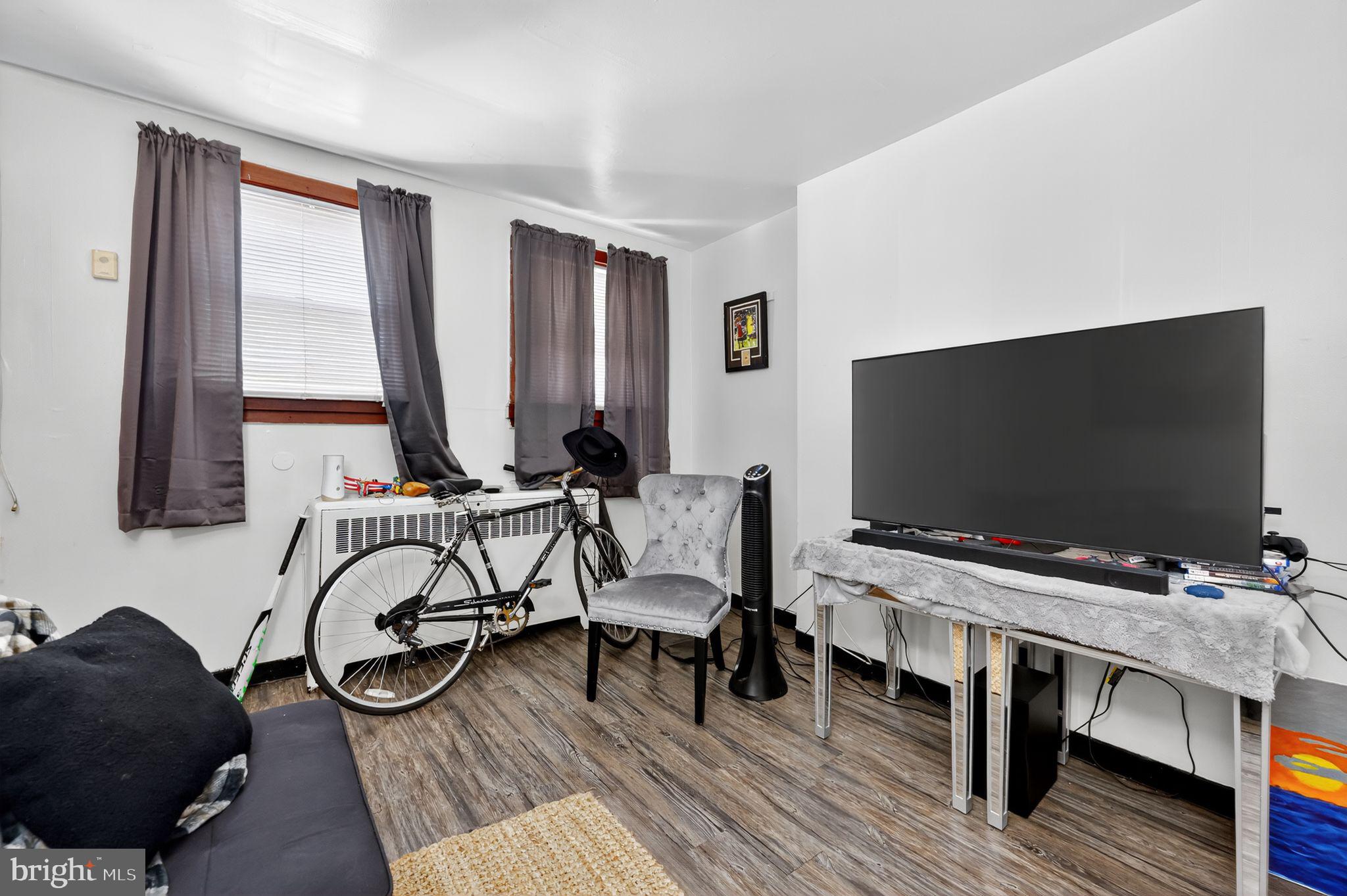 101 Main Street Roebling, NJ 08554 - Photo 17 of 55 a living room with furniture and a flat screen tv