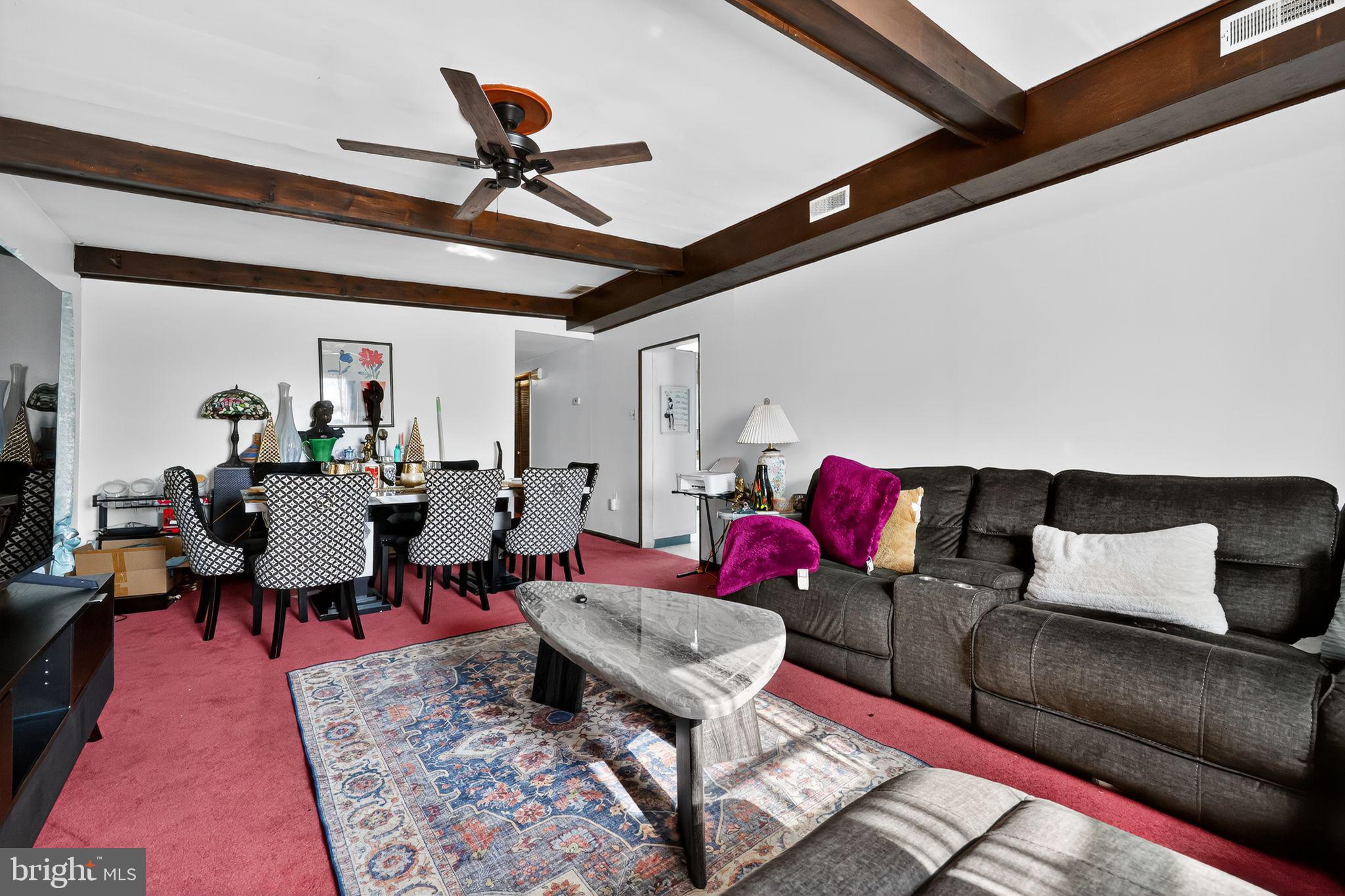 101 Main Street Roebling, NJ 08554 - Photo 18 of 55 a living room with lots of furniture and a rug