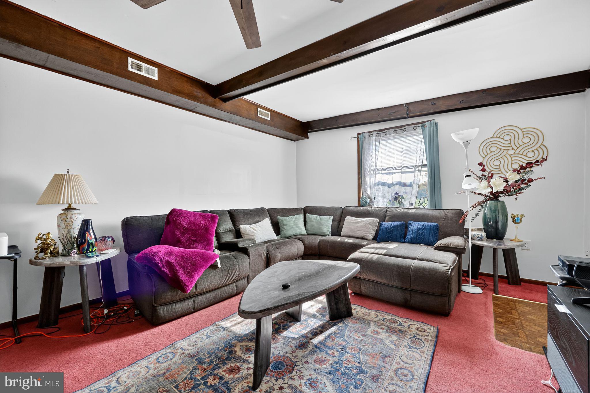 101 Main Street Roebling, NJ 08554 - Photo 19 of 55 a living room with furniture and a mirror