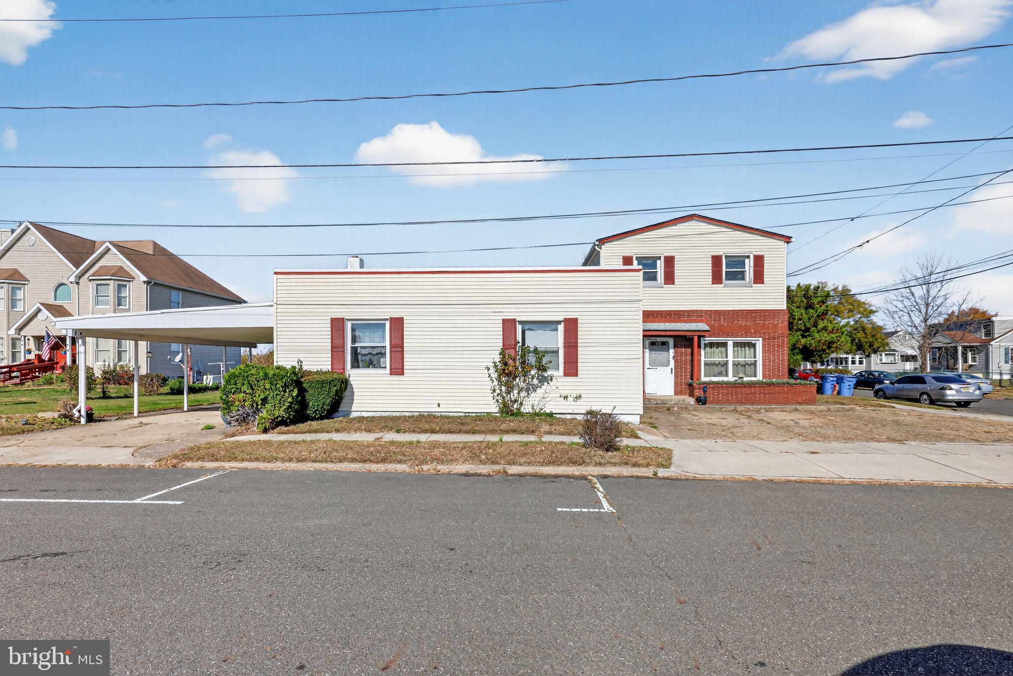 101 Main Street Roebling, NJ 08554 - Photo 2 of 55 a front view of a building with a street