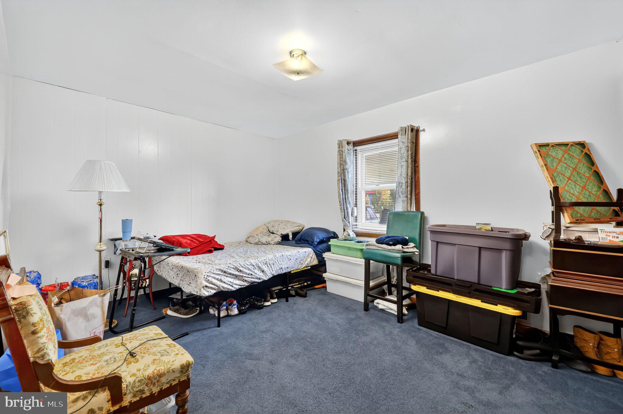 101 Main Street Roebling, NJ 08554 - Photo 23 of 55 a living room with furniture and a window