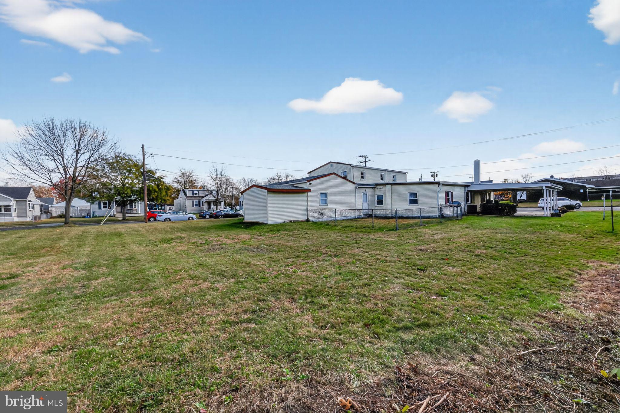 101 Main Street Roebling, NJ 08554 - Photo 53 of 55 a view of a house with a big yard and potted plants