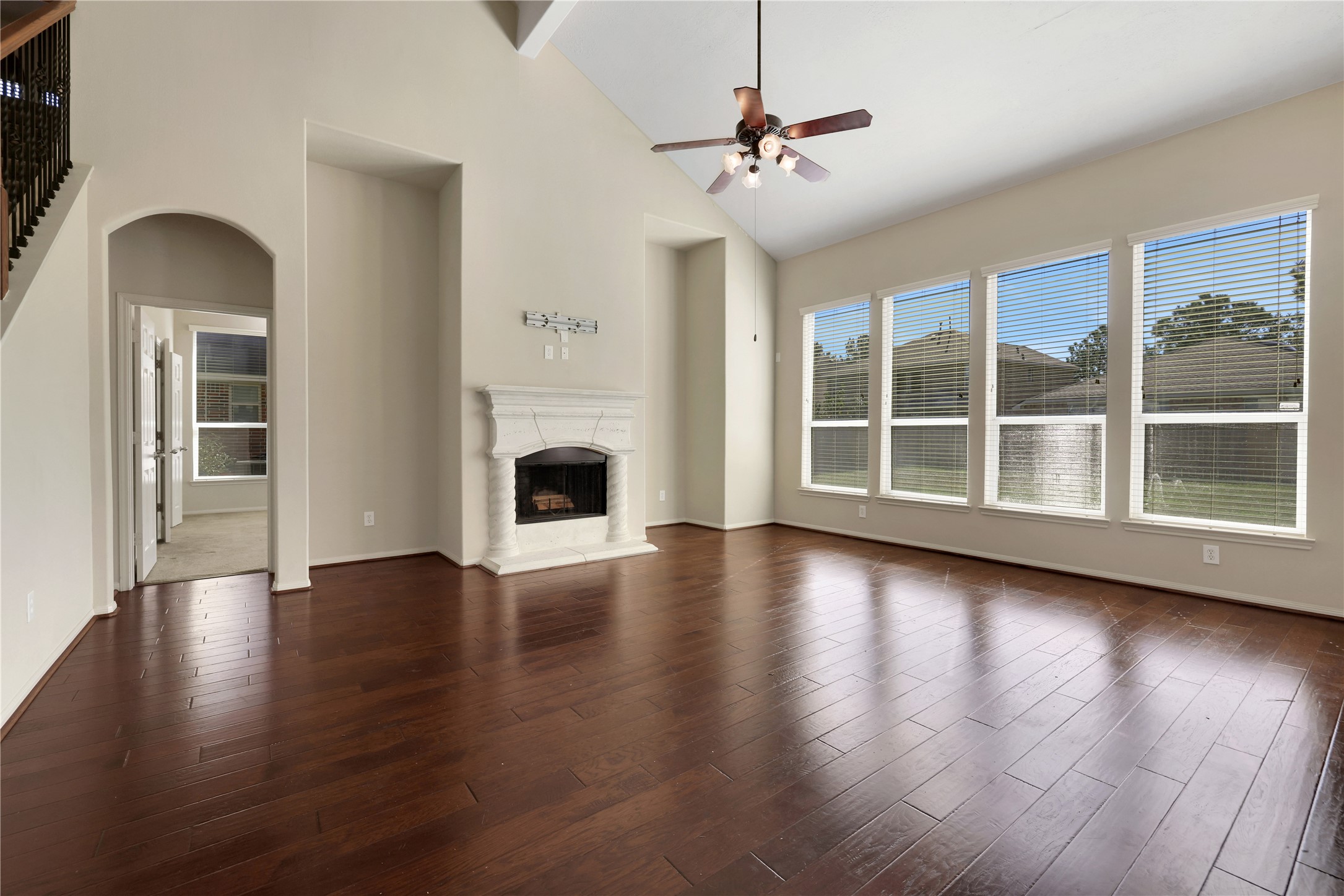 19815 Stanton Lake Drive Cypress, TX 77433 - Photo 15 of 50 a view of an empty room with wooden floor and a fireplace