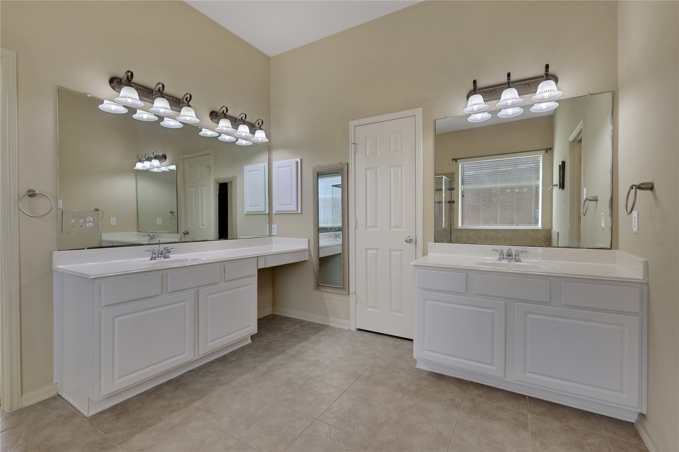 19815 Stanton Lake Drive Cypress, TX 77433 - Photo 27 of 50 a bathroom with a sink and a mirror