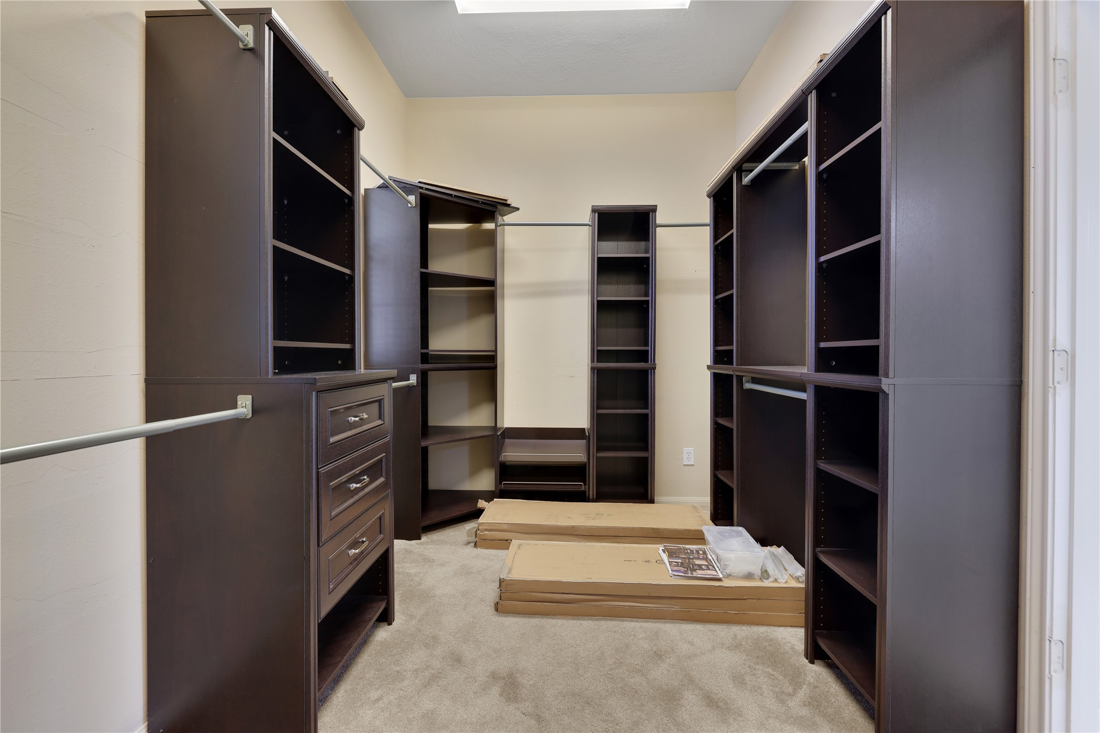 19815 Stanton Lake Drive Cypress, TX 77433 - Photo 30 of 50 a view of walk in closet with clothes and shoes