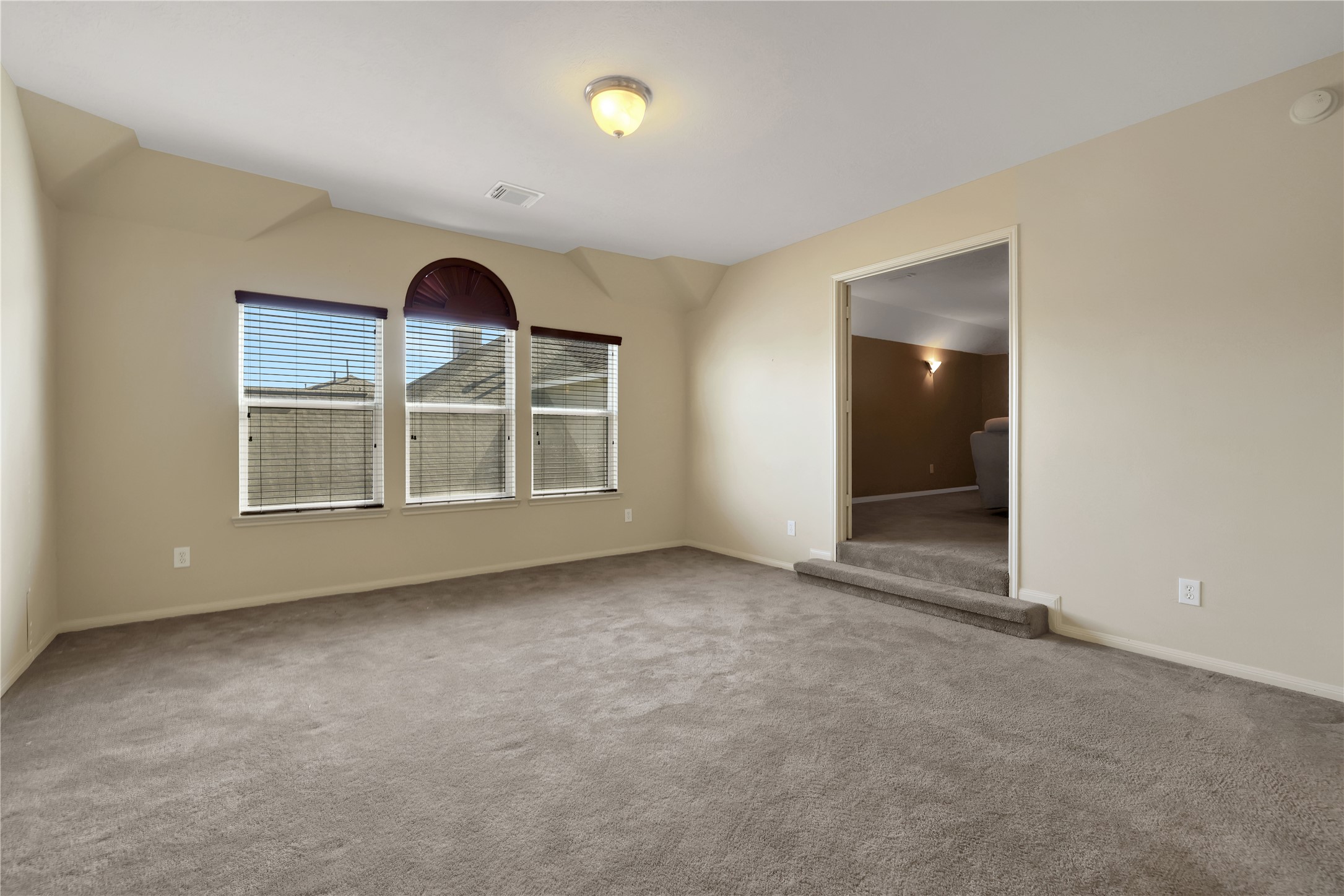 19815 Stanton Lake Drive Cypress, TX 77433 - Photo 35 of 50 an empty room with windows