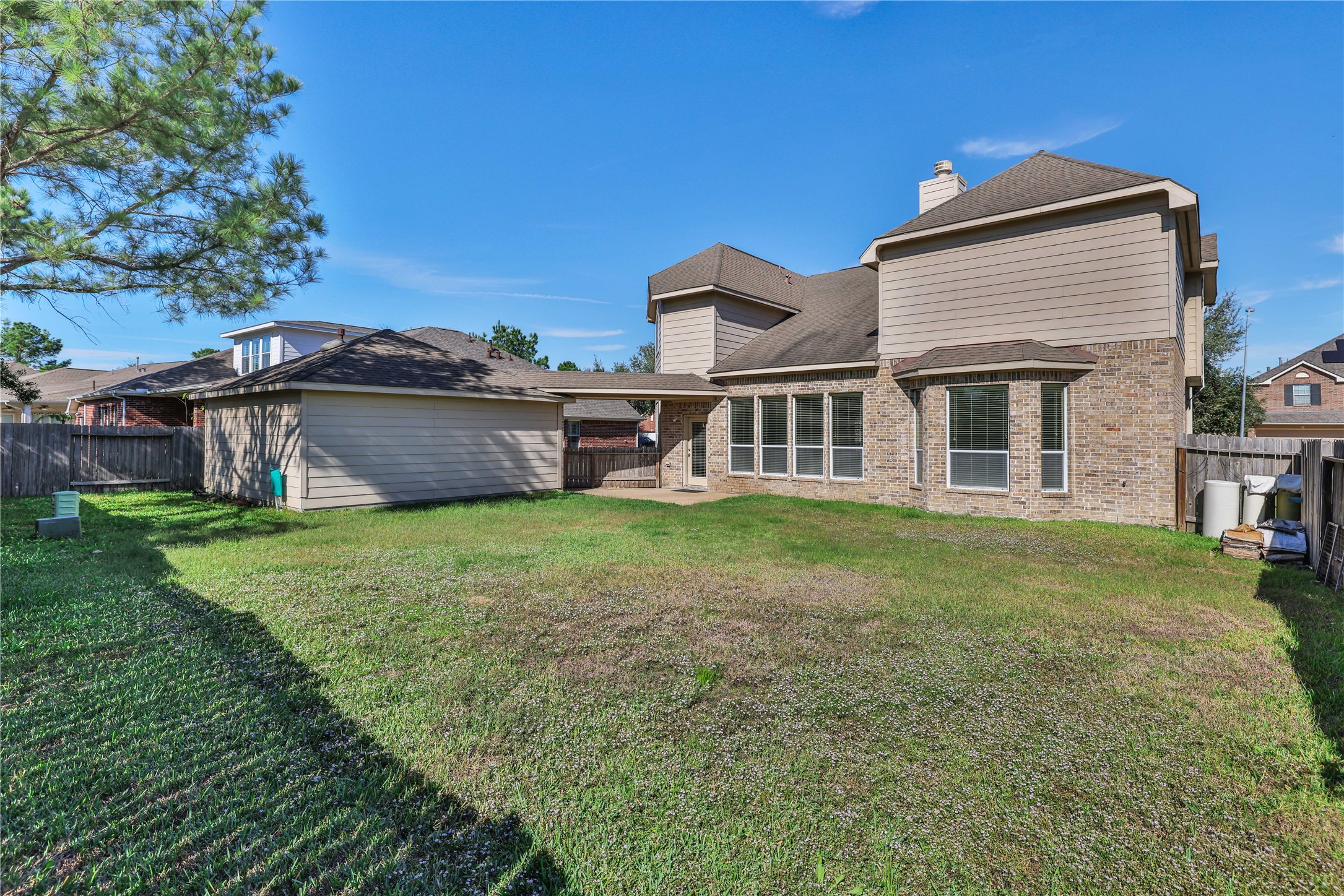 19815 Stanton Lake Drive Cypress, TX 77433 - Photo 47 of 50 a view of a house with a backyard