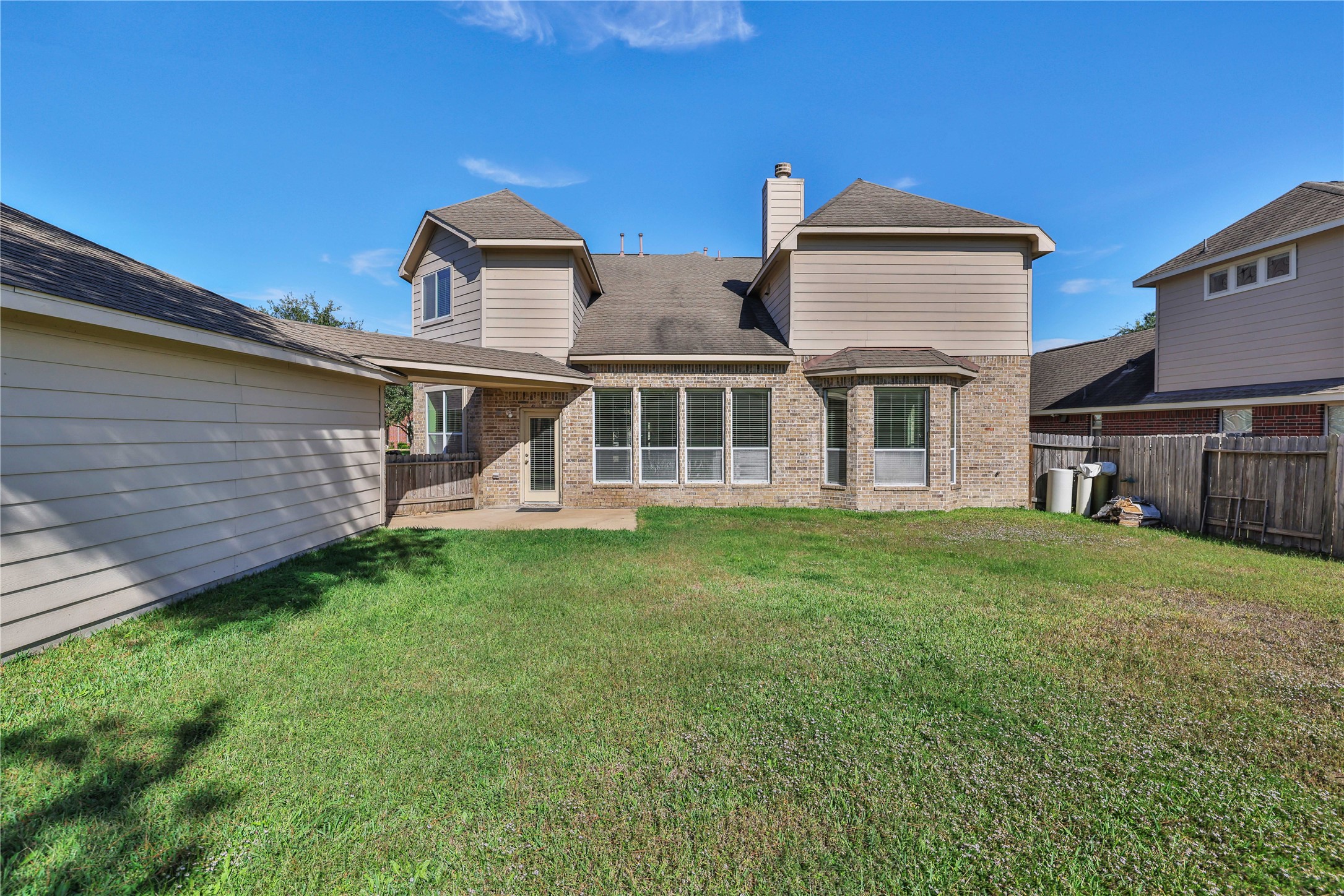 19815 Stanton Lake Drive Cypress, TX 77433 - Photo 48 of 50 a front view of a house with a garden