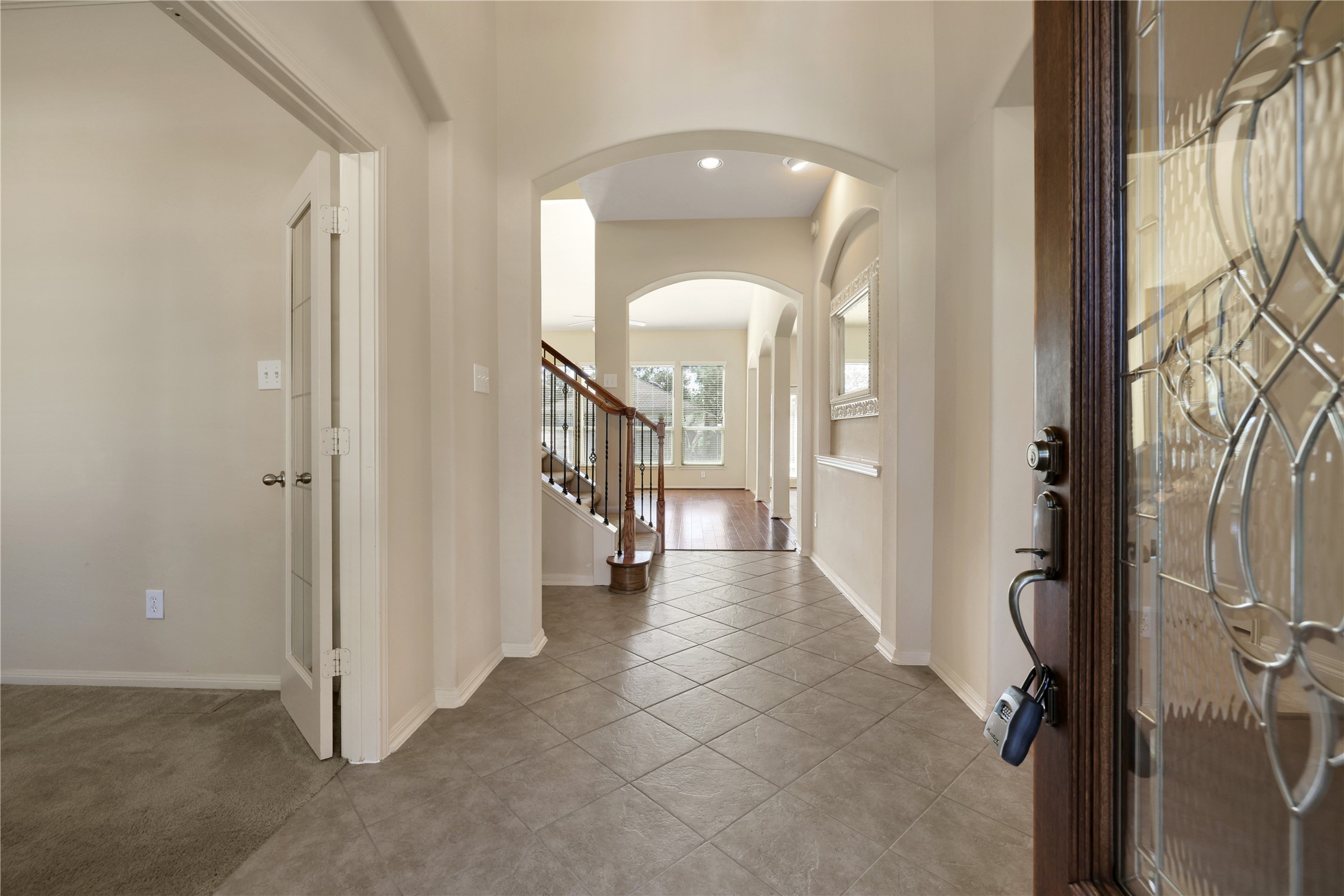 19815 Stanton Lake Drive Cypress, TX 77433 - Photo 8 of 50 a view of a hallway with windows