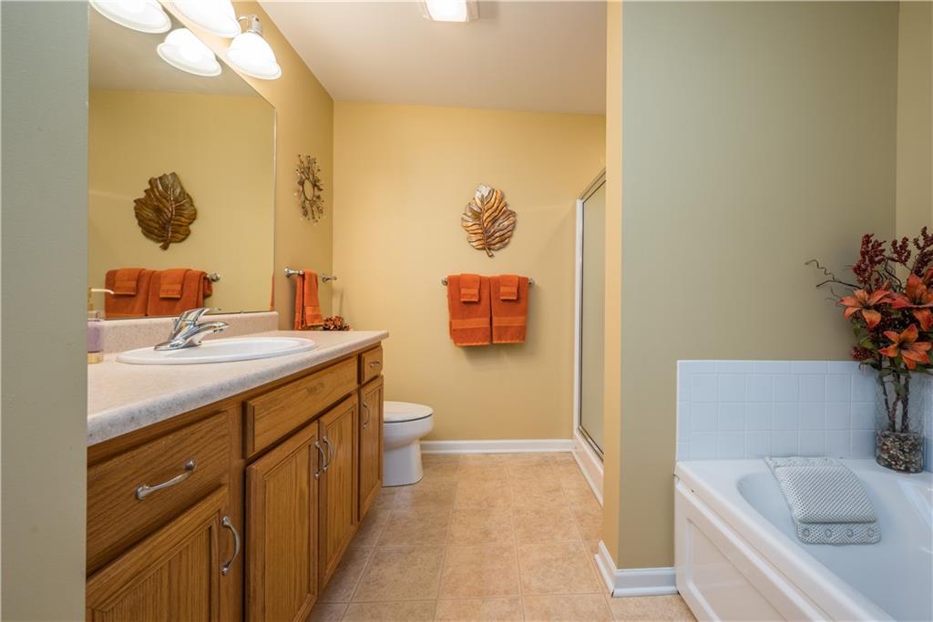 5534 Lantern Hill Extension Pittsburgh, PA 15236 - Photo 18 of 33 a bathroom with a sink and a mirror