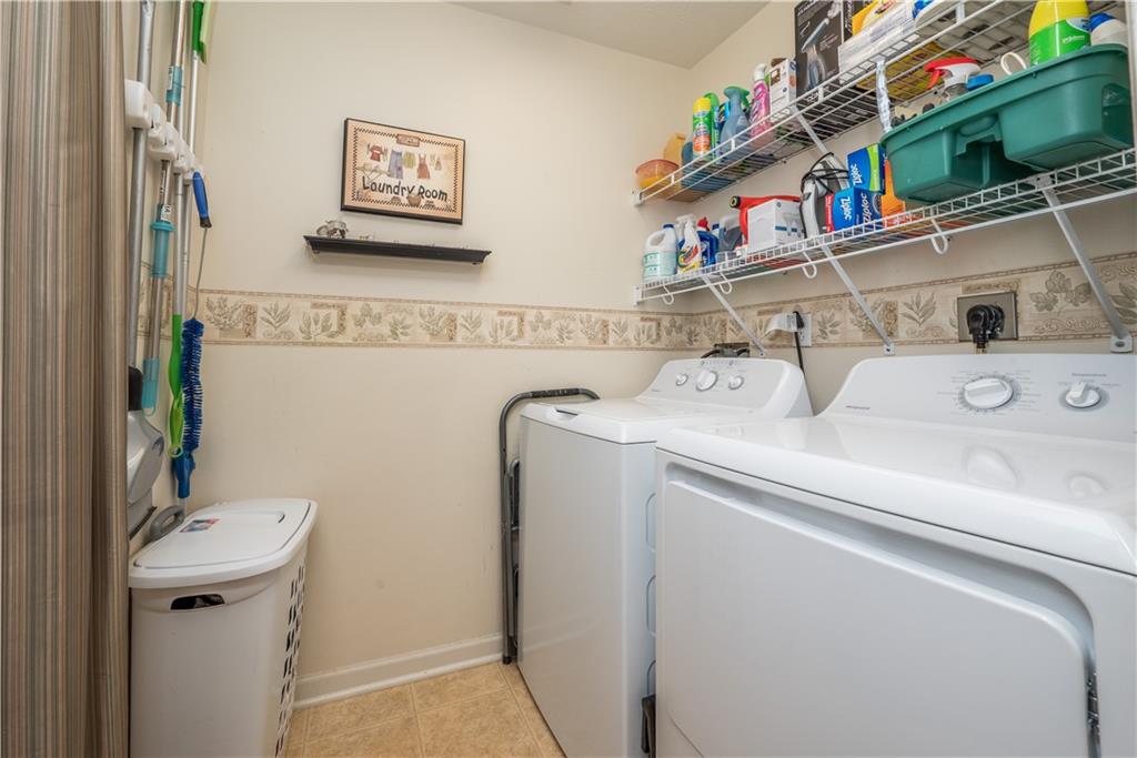 5534 Lantern Hill Extension Pittsburgh, PA 15236 - Photo 28 of 33 a utility room with dryer and washer
