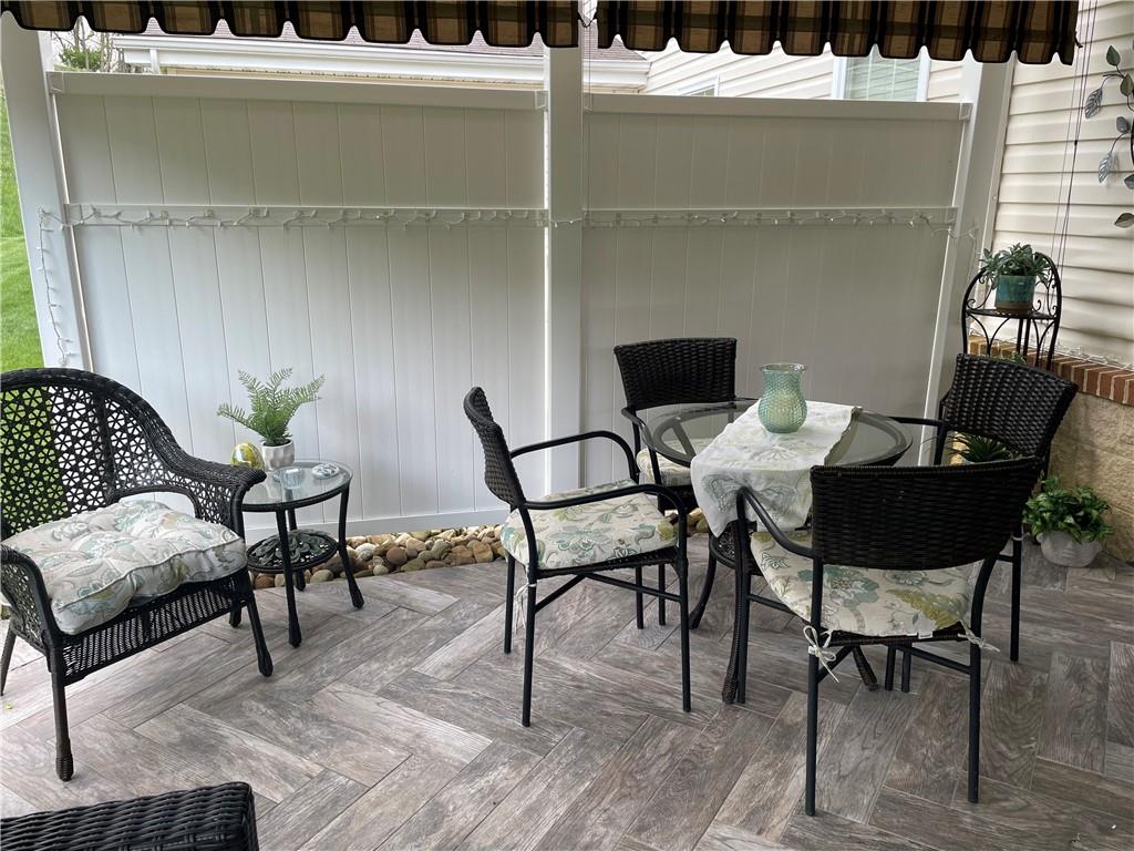 5534 Lantern Hill Extension Pittsburgh, PA 15236 - Photo 32 of 33 a view of a dining room with furniture and wooden floor