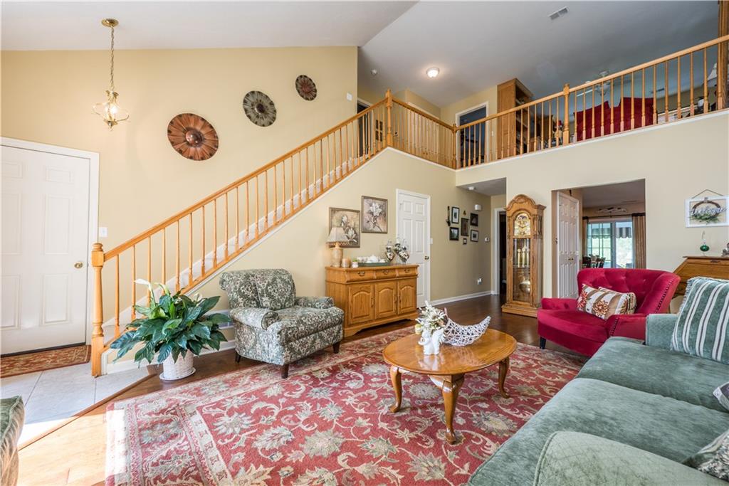 5534 Lantern Hill Extension Pittsburgh, PA 15236 - Photo 5 of 33 a living room with furniture and a rug