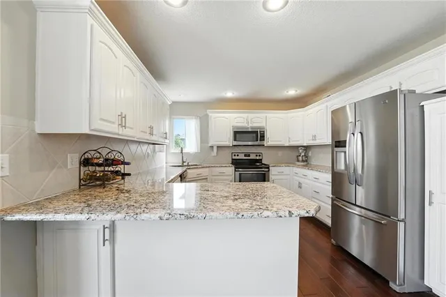 $395,000 | 8002 Northeast 111th Terrace, Kansas City, MO 64157