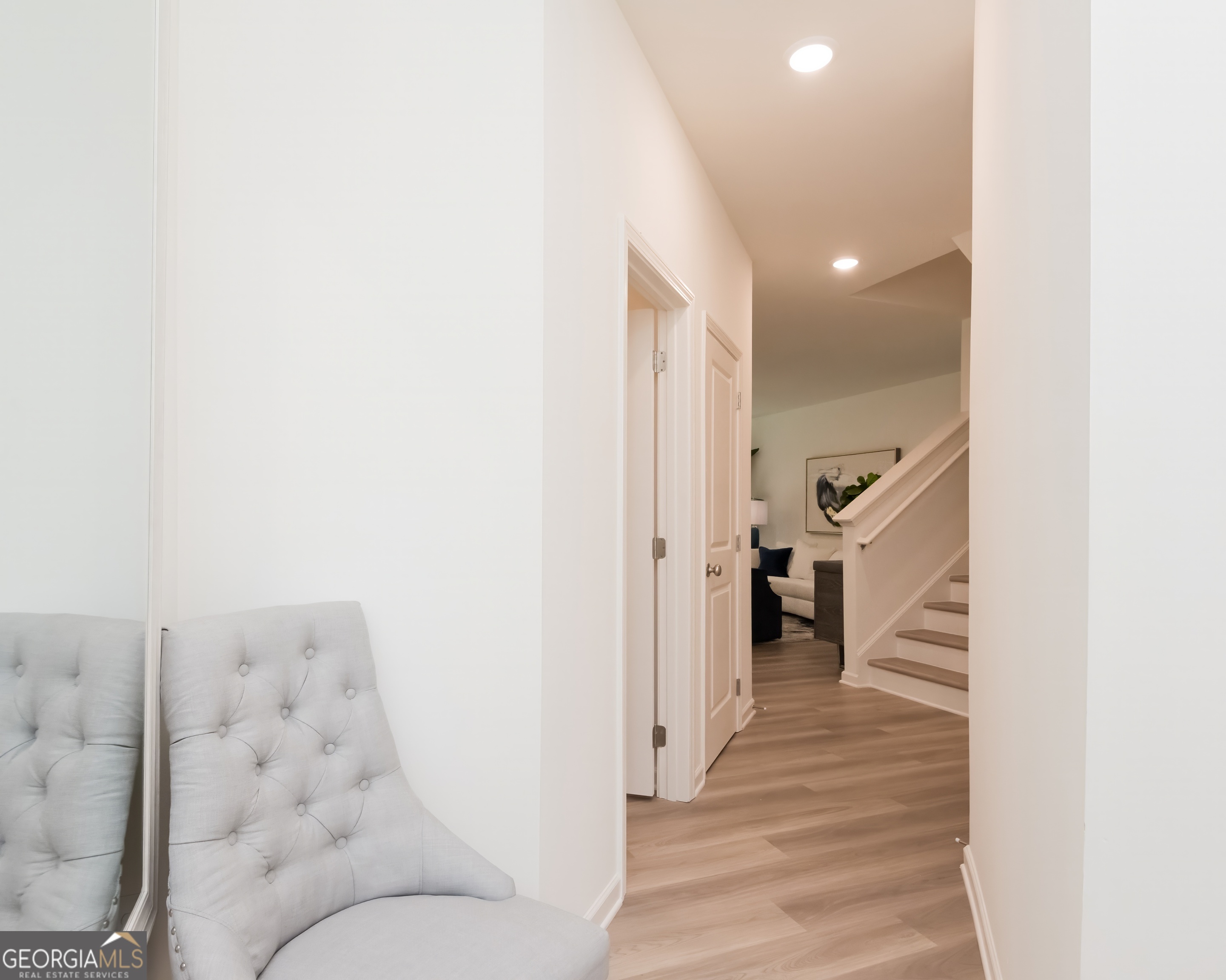 2553 Riverside Court Northeast Conyers, GA 30013 - Photo 3 of 40 a living room with furniture and wooden floor