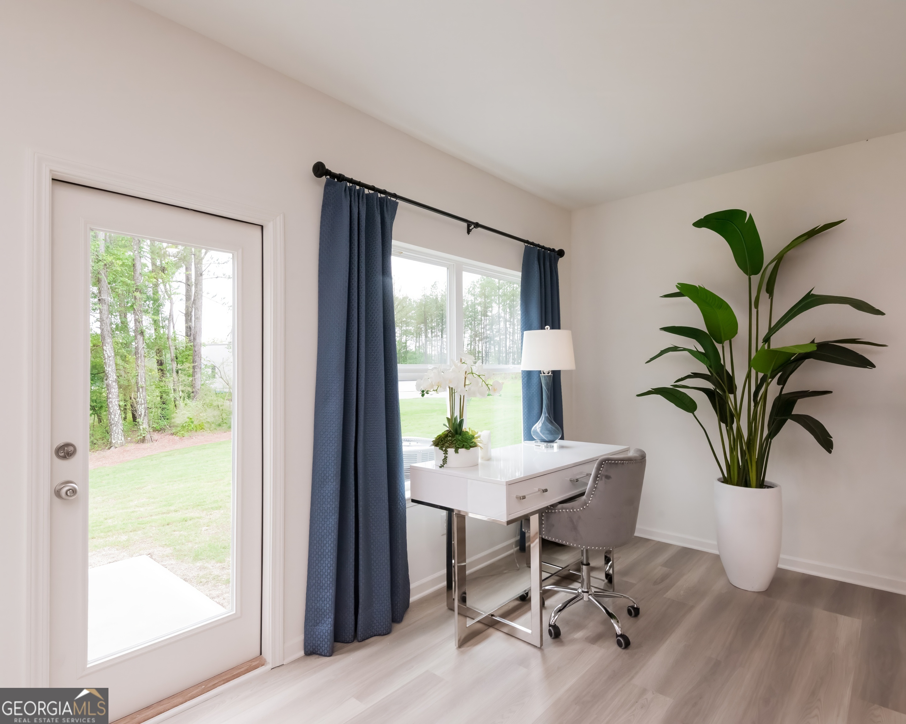 2553 Riverside Court Northeast Conyers, GA 30013 - Photo 34 of 40 a workspace with furniture and a window