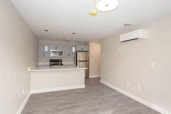 a view of kitchen with microwave and stove